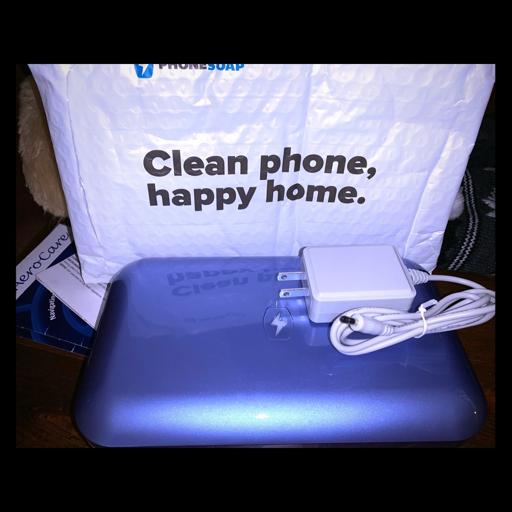PhoneSoap kills 99.99% of the bacteria on phone.